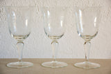 Set of eight vintage red wine glasses with decorative etchings