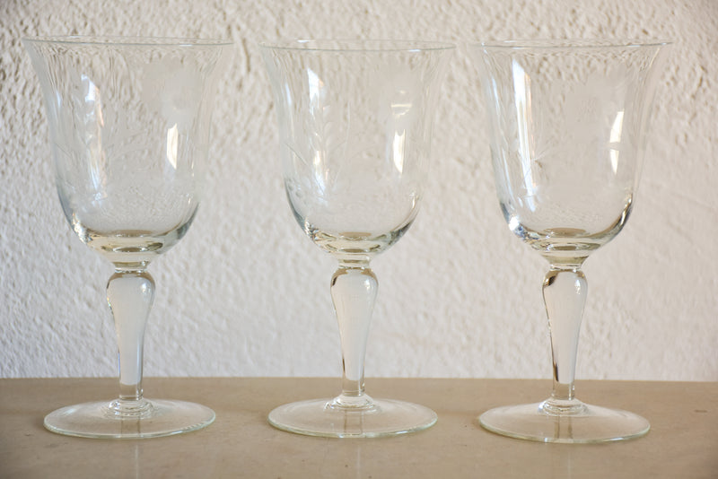 Set of eight vintage red wine glasses with decorative etchings