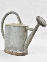 Very small vintage zinc watering can