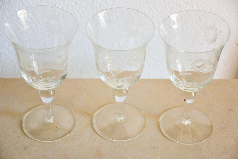 Set of eight vintage red wine glasses with decorative etchings