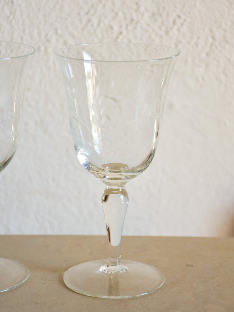 Set of eight vintage red wine glasses with decorative etchings