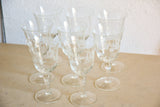 Set of eight vintage red wine glasses with decorative etchings