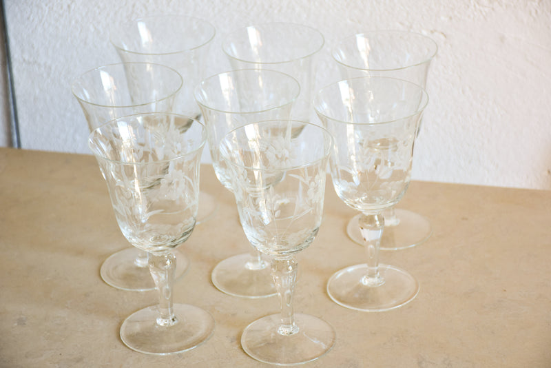 Set of eight vintage red wine glasses with decorative etchings
