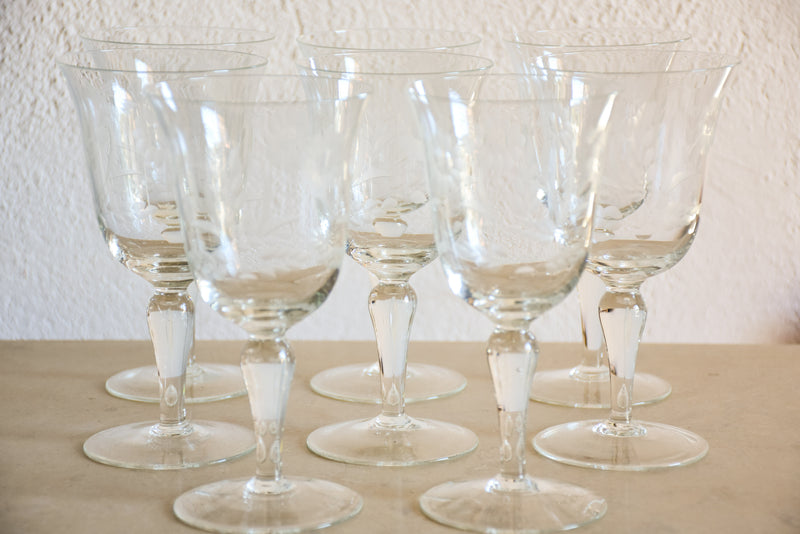 Set of eight vintage red wine glasses with decorative etchings