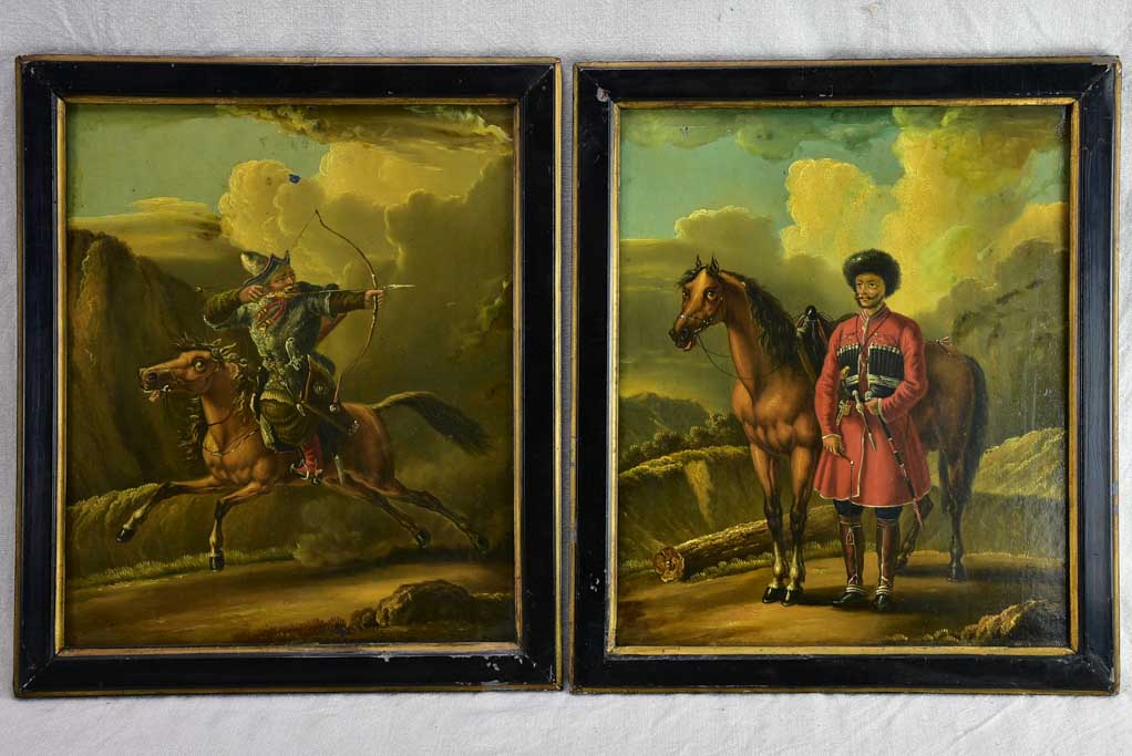 Rare pair of oil on tole paintings of military men on horseback 18" x 15¼"