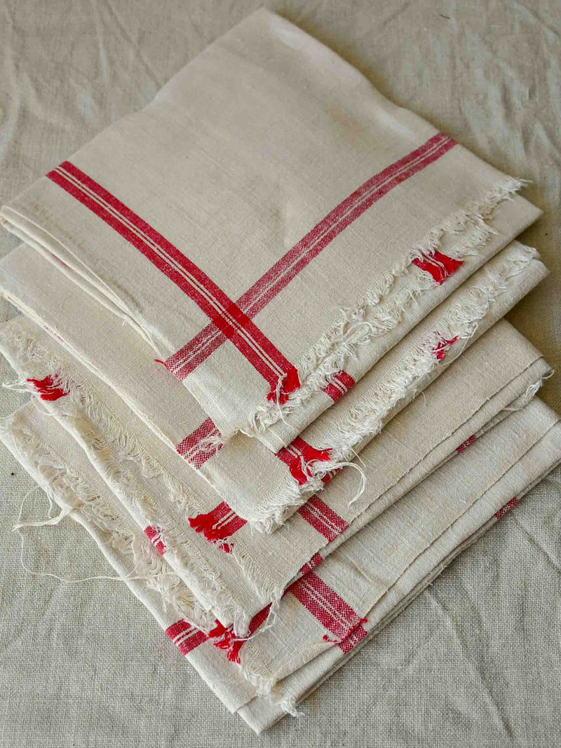 Four antique French tea towels / serviettes with red stripes
