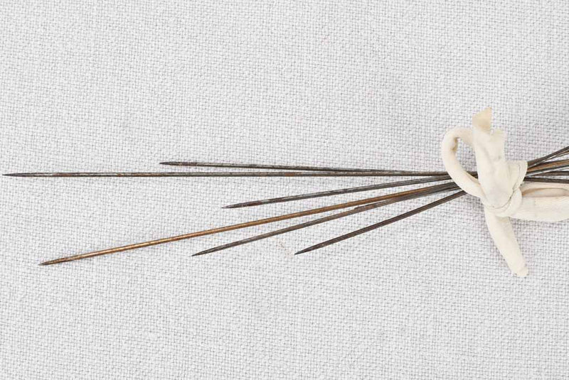 Intricate late-nineteenth century glass hat pins