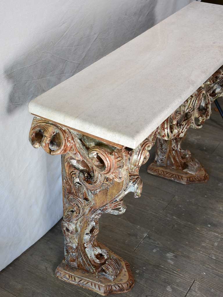 Magnificent carved console with travertine top 52" wide