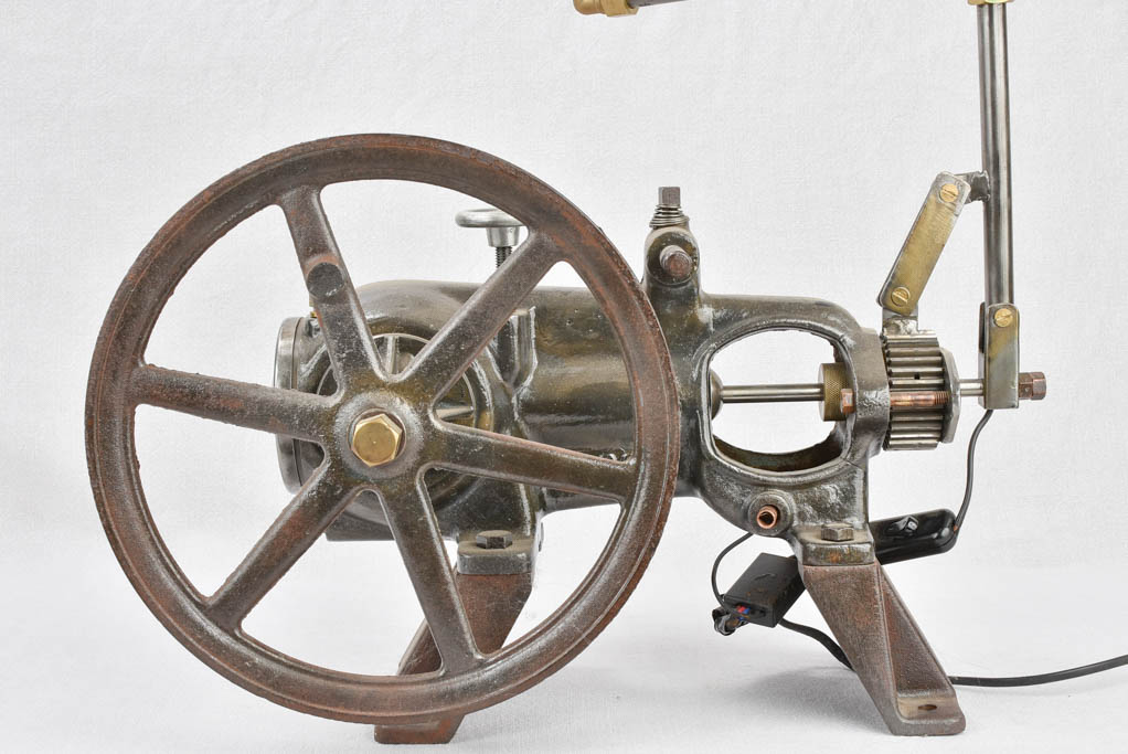 Salvaged pump and motorbike table lamp