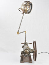 Salvaged pump and motorbike table lamp