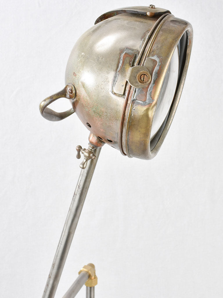 Salvaged pump and motorbike table lamp