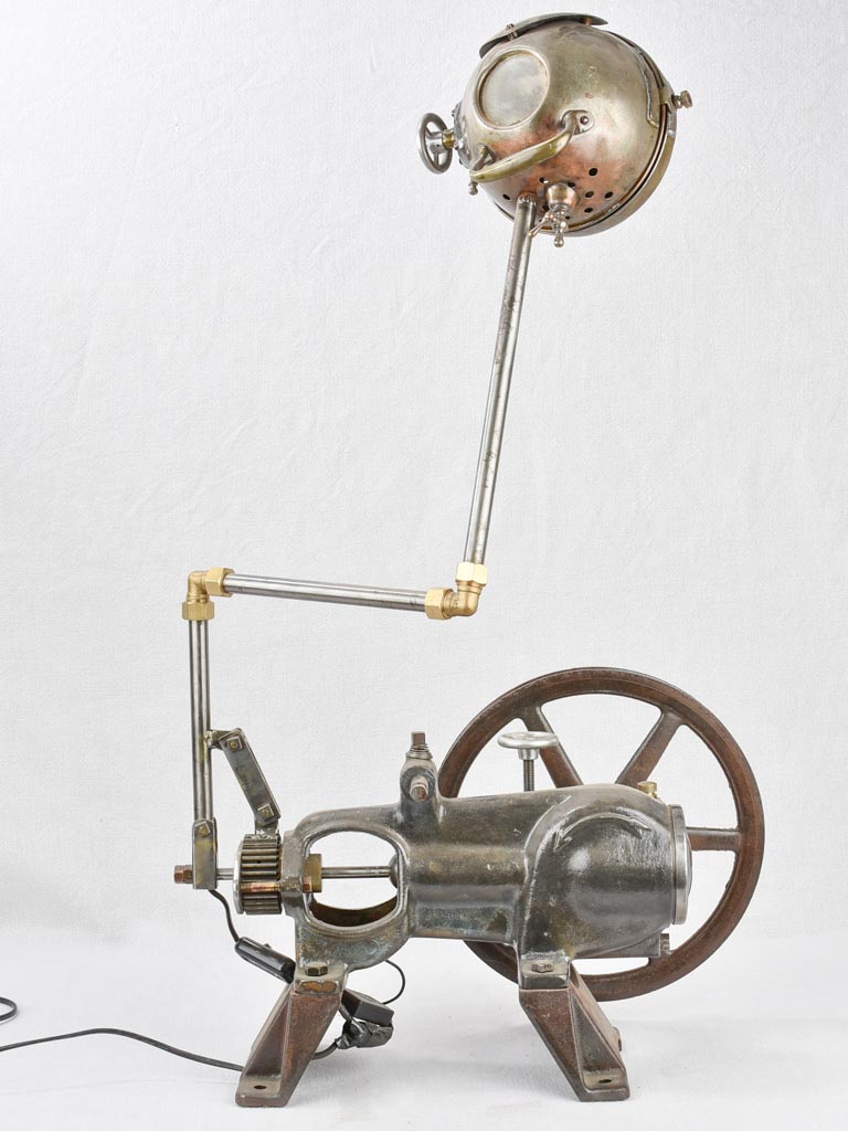 Salvaged pump and motorbike table lamp