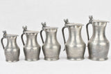 Decorated acorn tin pitcher collection