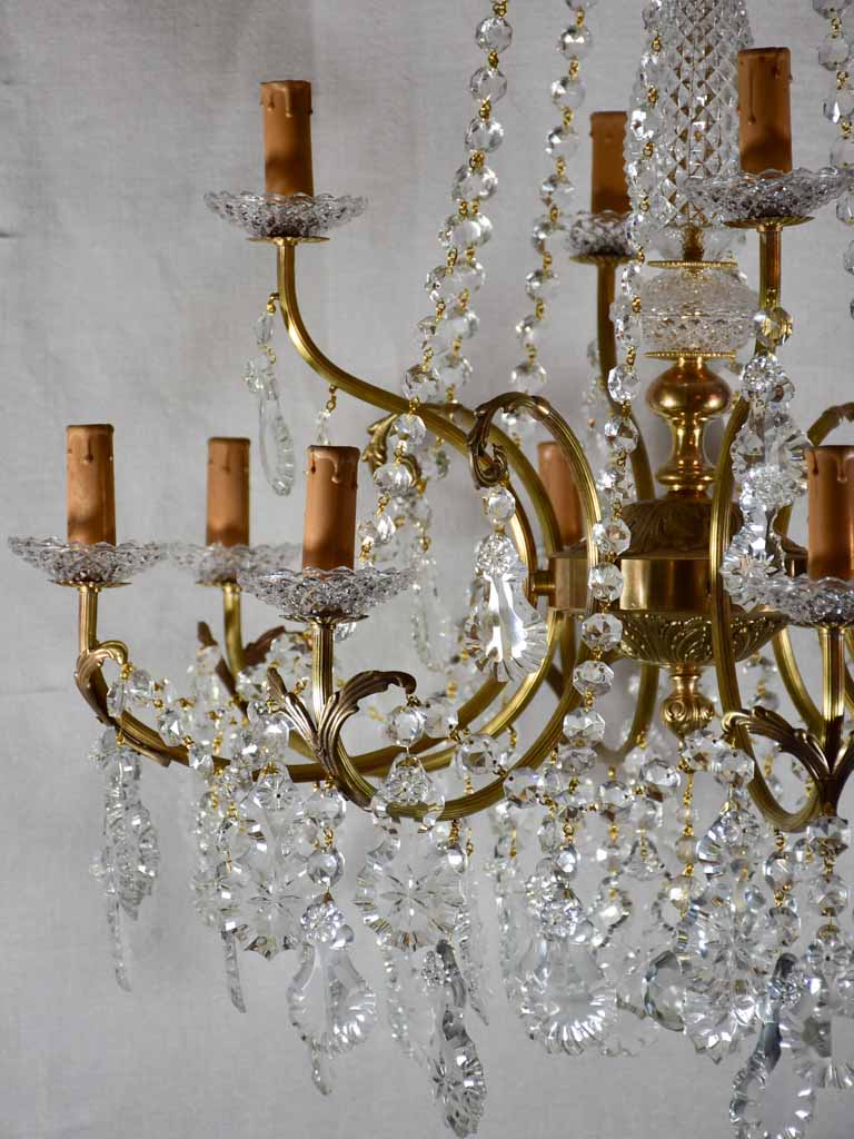 Pair of large crystal and brass chandeliers with 15 lights from the 1940's 35½" diameter