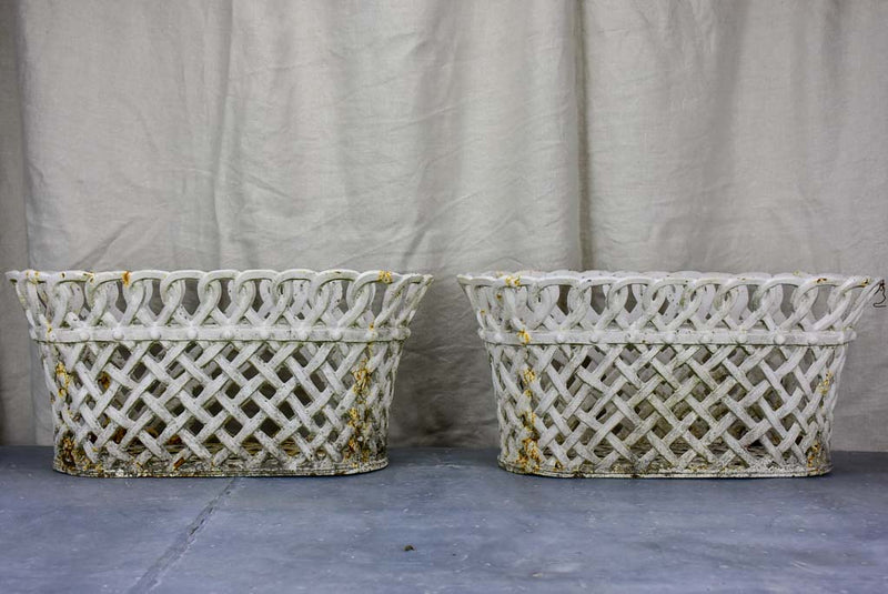 Pair of antique French woven iron plant stands