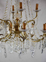 Pair of large crystal and brass chandeliers with 15 lights from the 1940's 35½" diameter