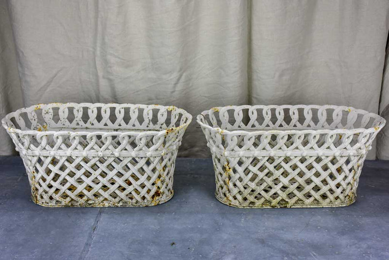 Pair of antique French woven iron plant stands