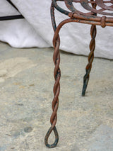 Pair of pretty black antique French garden chairs branded Vachon