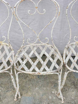 Four antique French garden chairs with heart back and lattice seat