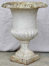 Pair of antique French cast iron Medici urns - white