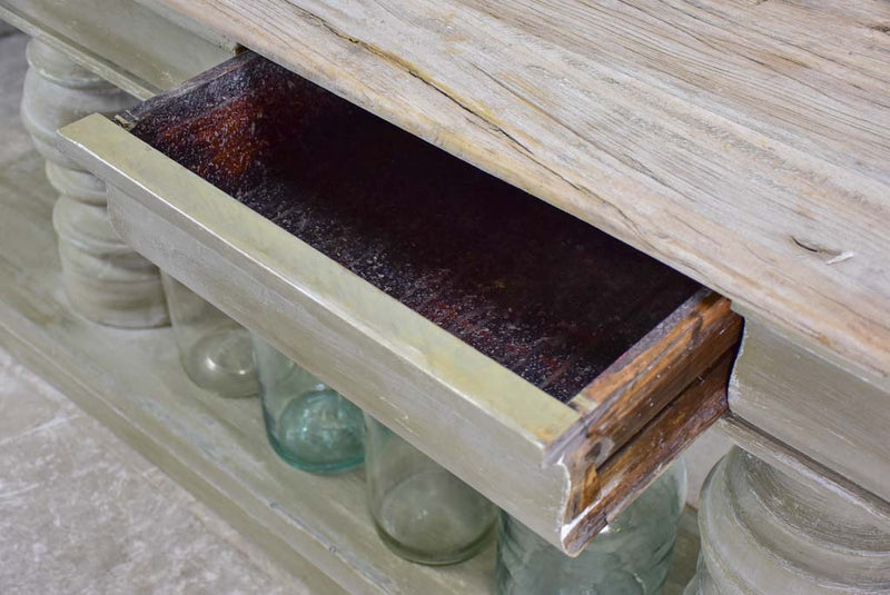 Narrow French console table with large turned column supports 78¾"