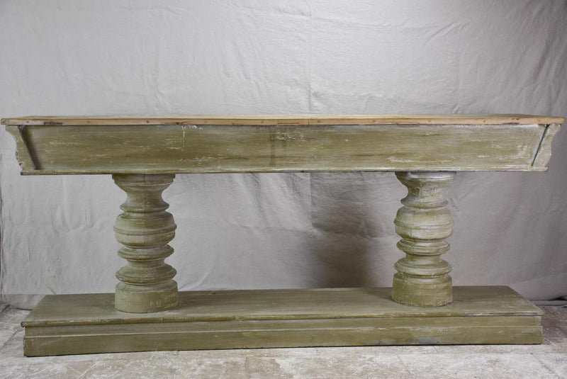 Narrow French console table with large turned column supports 78¾"