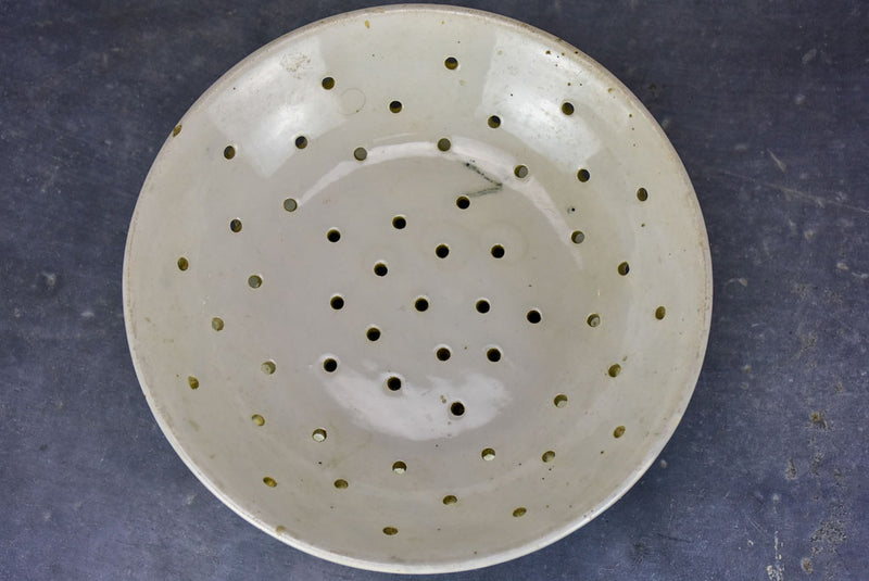 Antique French fruit strainer with catchment plate underneath