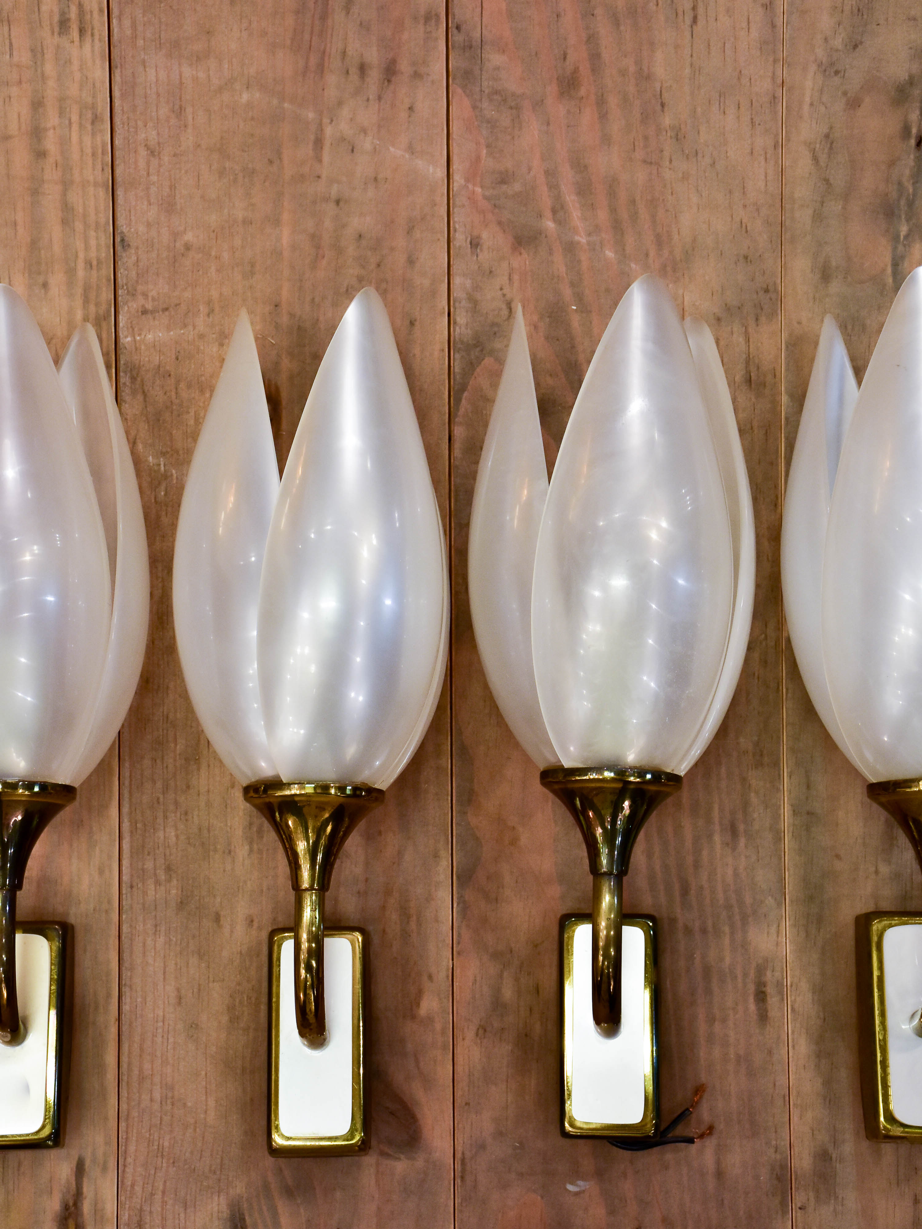 Set of four tulip-shaped Liane Rougier wall sconces