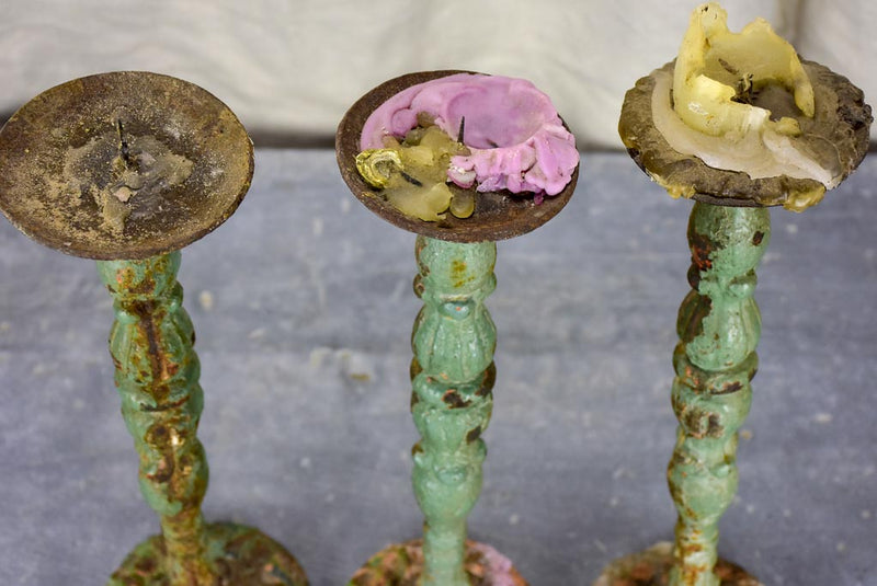 Three antique French candlesticks made from salvaged spindles
