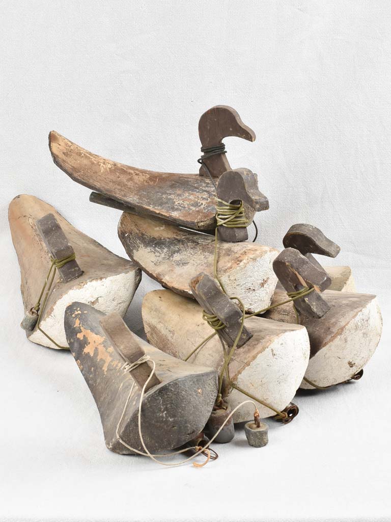 7 antique French wooden duck decoys