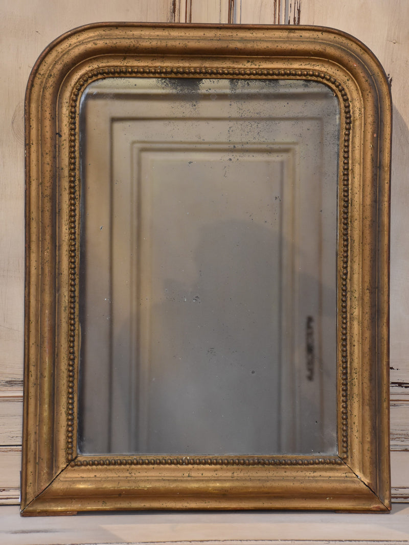 Petite 19th century Louis Philippe mirror with gilt frame