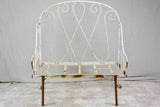 Antique French wrought iron folding armchair bed