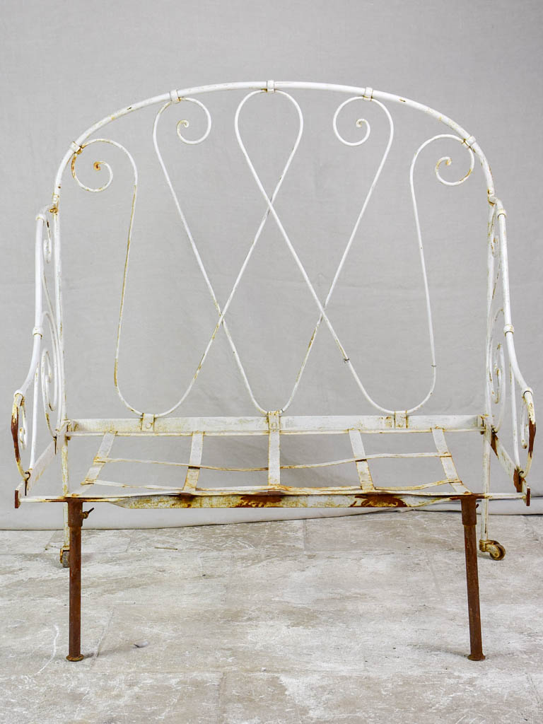 Antique French wrought iron folding armchair bed