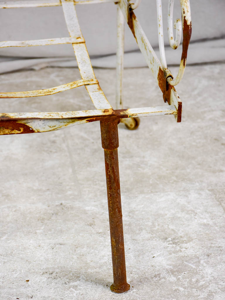 Antique French wrought iron folding armchair bed