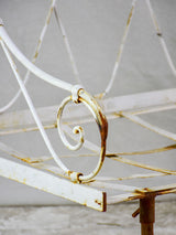 Antique French wrought iron folding armchair bed