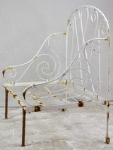 Antique French wrought iron folding armchair bed