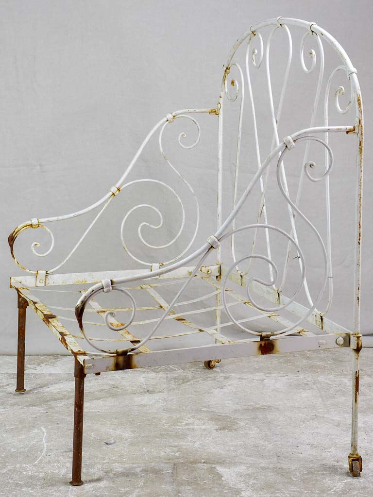 Antique French wrought iron folding armchair bed