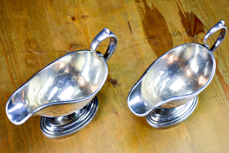 Two antique French sauce boats with monogram