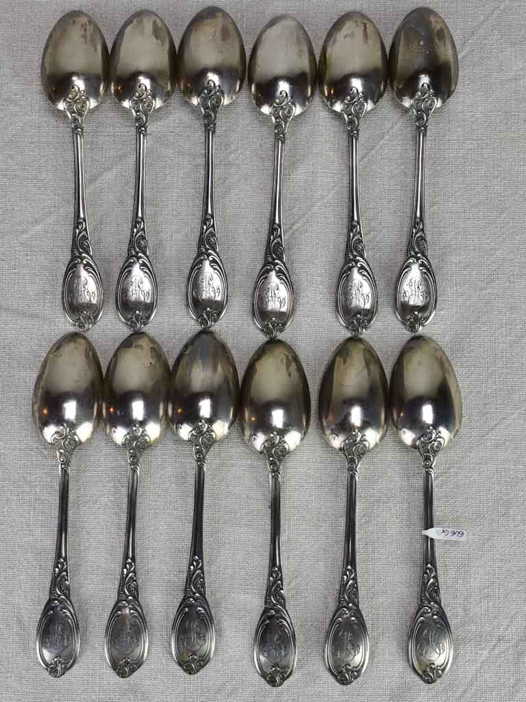 Set of 12 19th century French silver spoons with monogram 646 grams