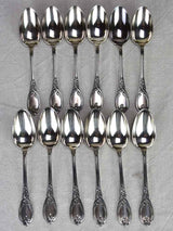 Set of 12 19th century French silver spoons with monogram 646 grams