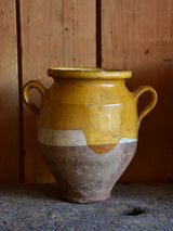 Three antique French confit pots with orange glaze