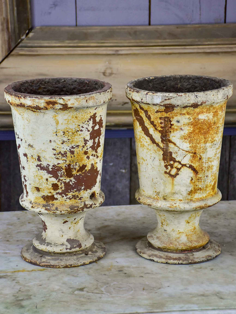 Two antique French cast iron vases