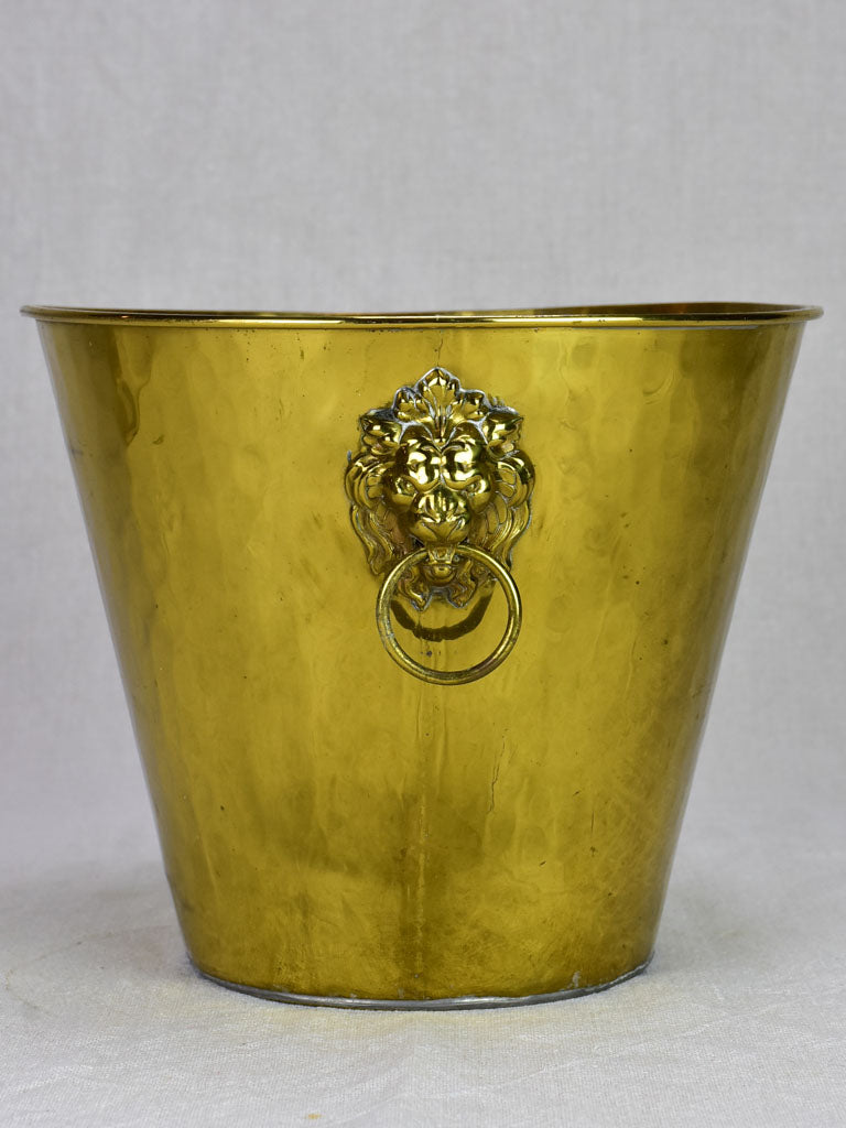 Vintage ice bucket with lions head handles and hammered brass 9¾"