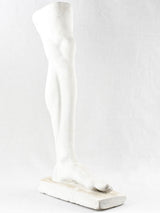 Artistic plaster sculpture of human leg