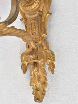 Refined craftsmanship Louis XVI bronze sconces