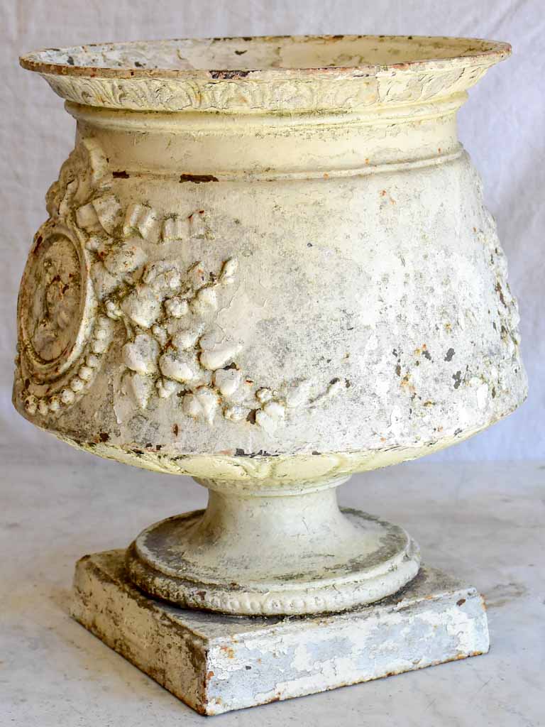 19th Century French cast iron urn with medallion and garlands - white 17¾"