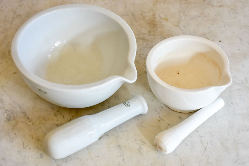 Two small antique French pharmacy mortar and pestles