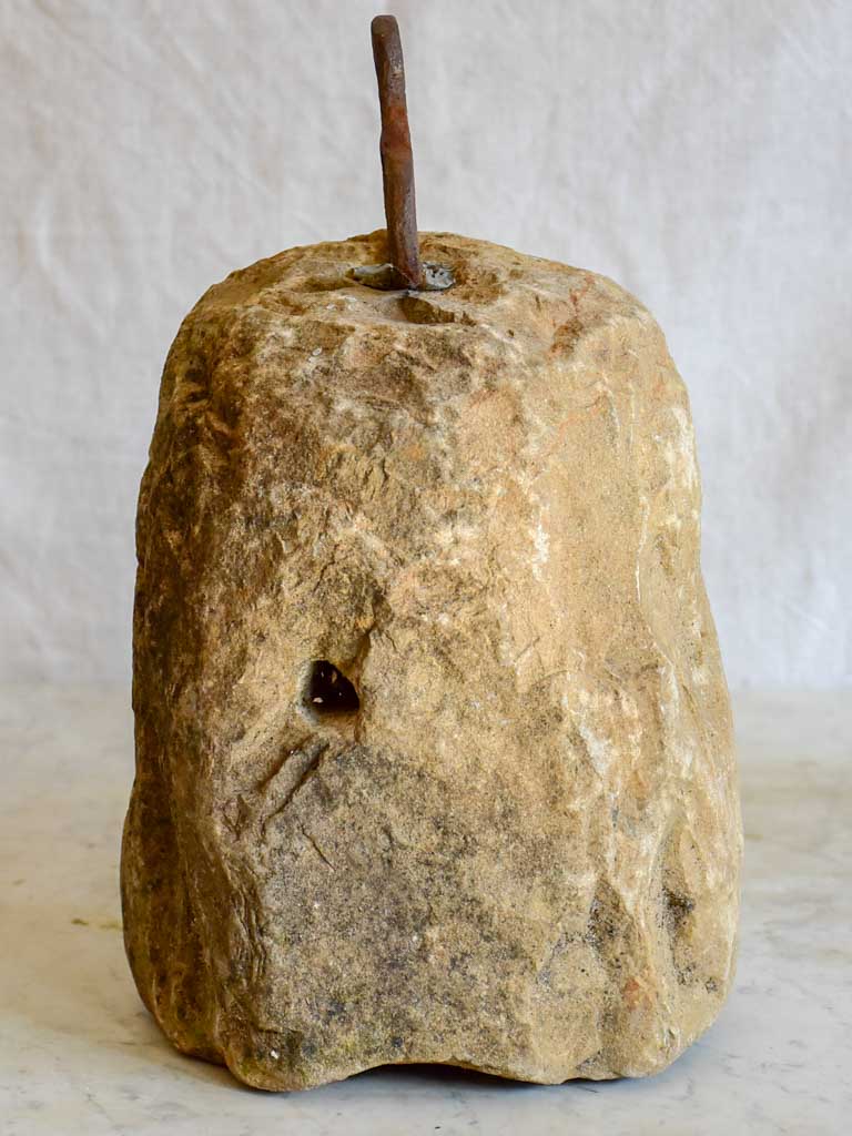 Antique French stone counterweight with iron handle