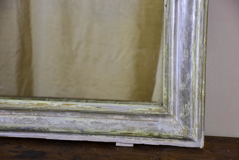 Large antique French Louis Philippe mirror with silver frame