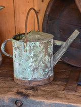 Antique French watering can with blue / green patina